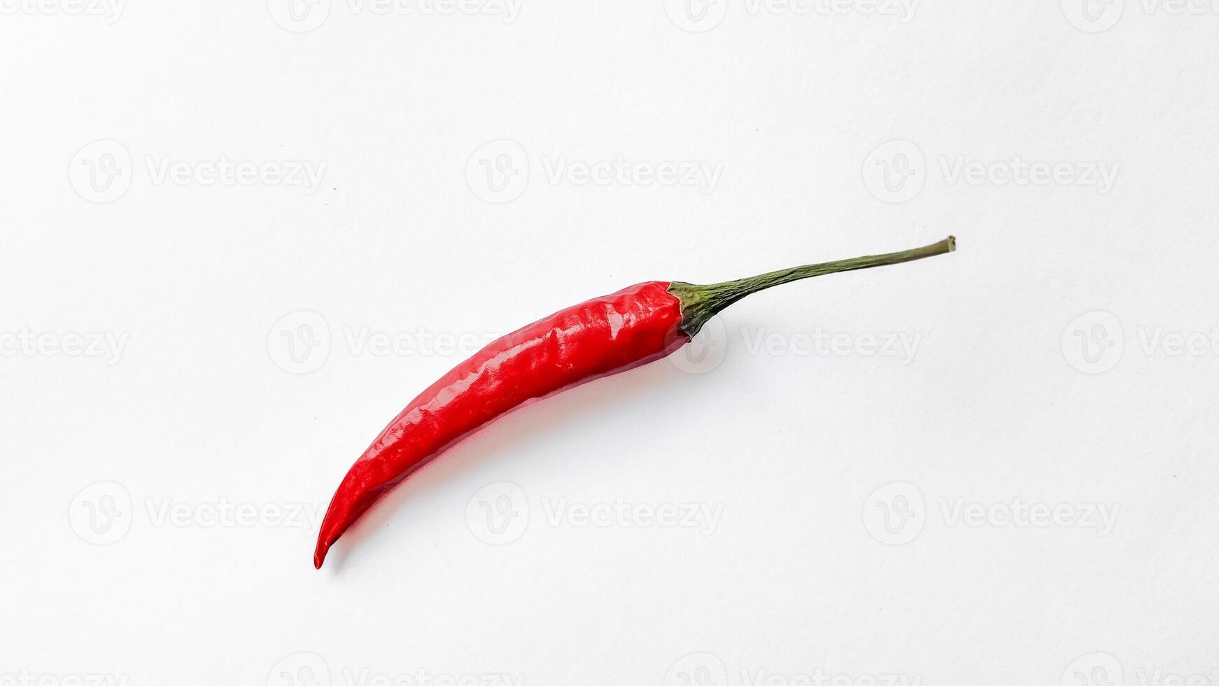 Vibrant Red Chili Pepper on White Background photo