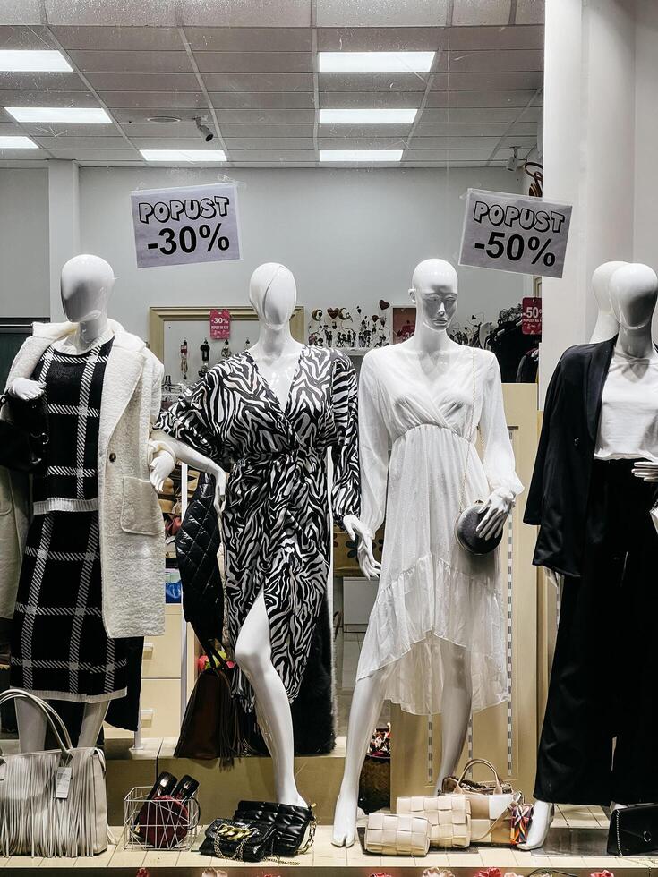 Budva, Montenegro - 25 december 2022. Shop window with women evening dresses and accessories photo