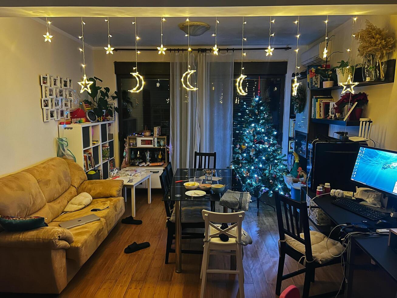 Podgorica, Montenegro - 25 december 2022. Christmas decorations hanging from the ceiling in the apartment photo