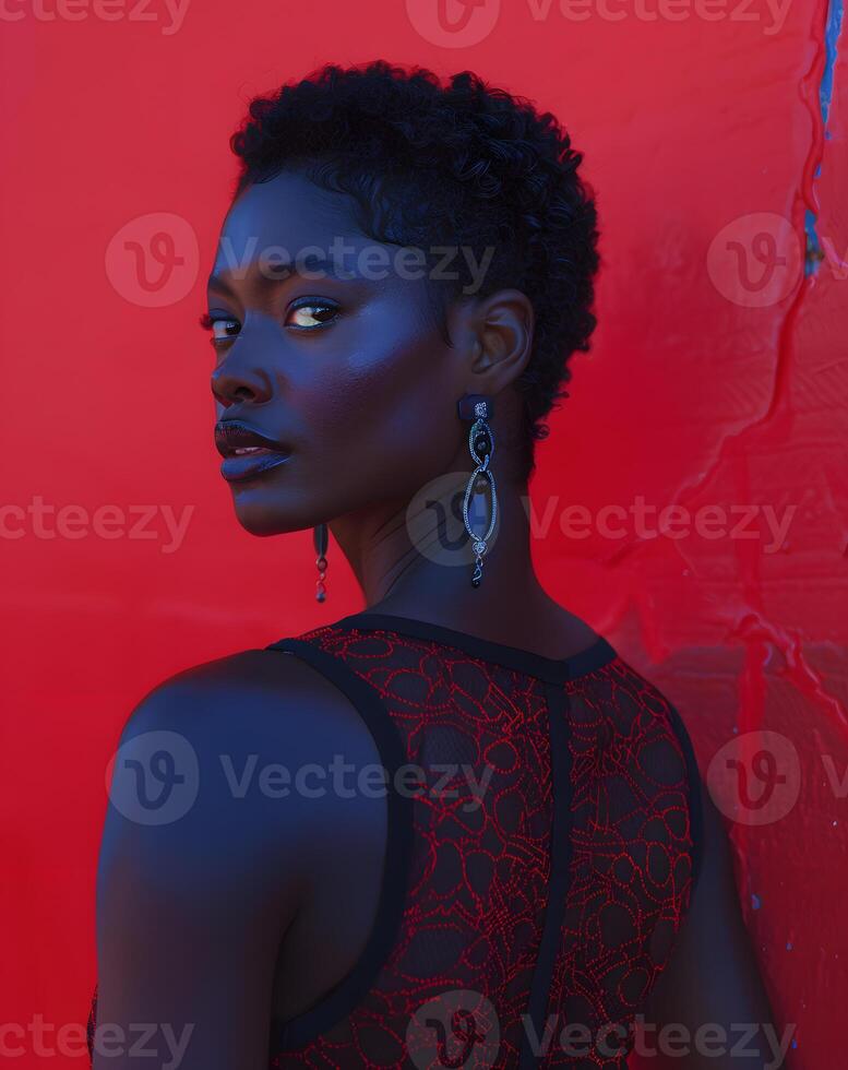 AI Generated A woman with black hair and electric blue earrings is standing by a red wall photo