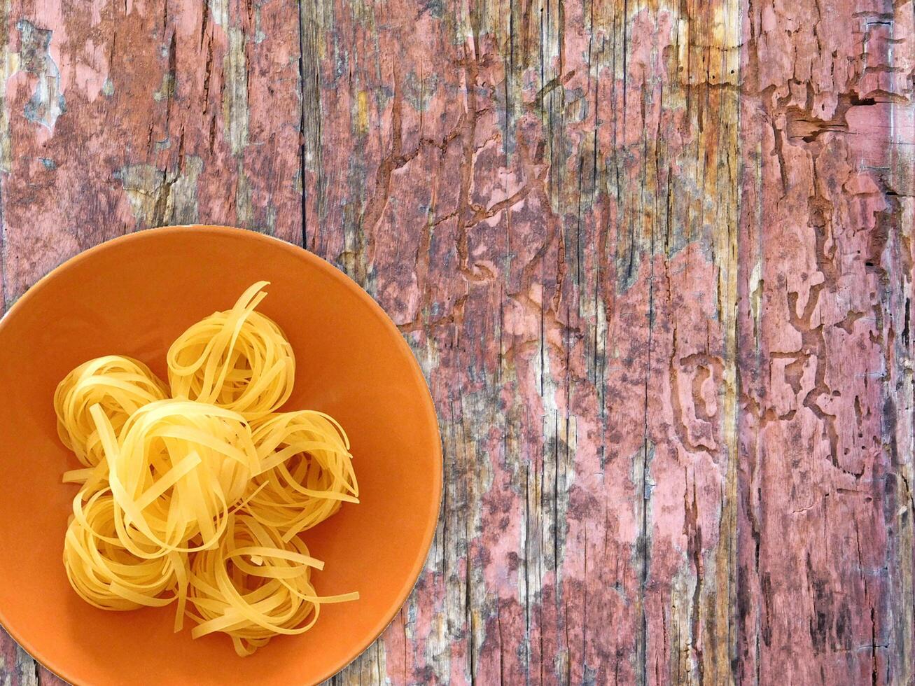 Pasta On Wooden Background photo