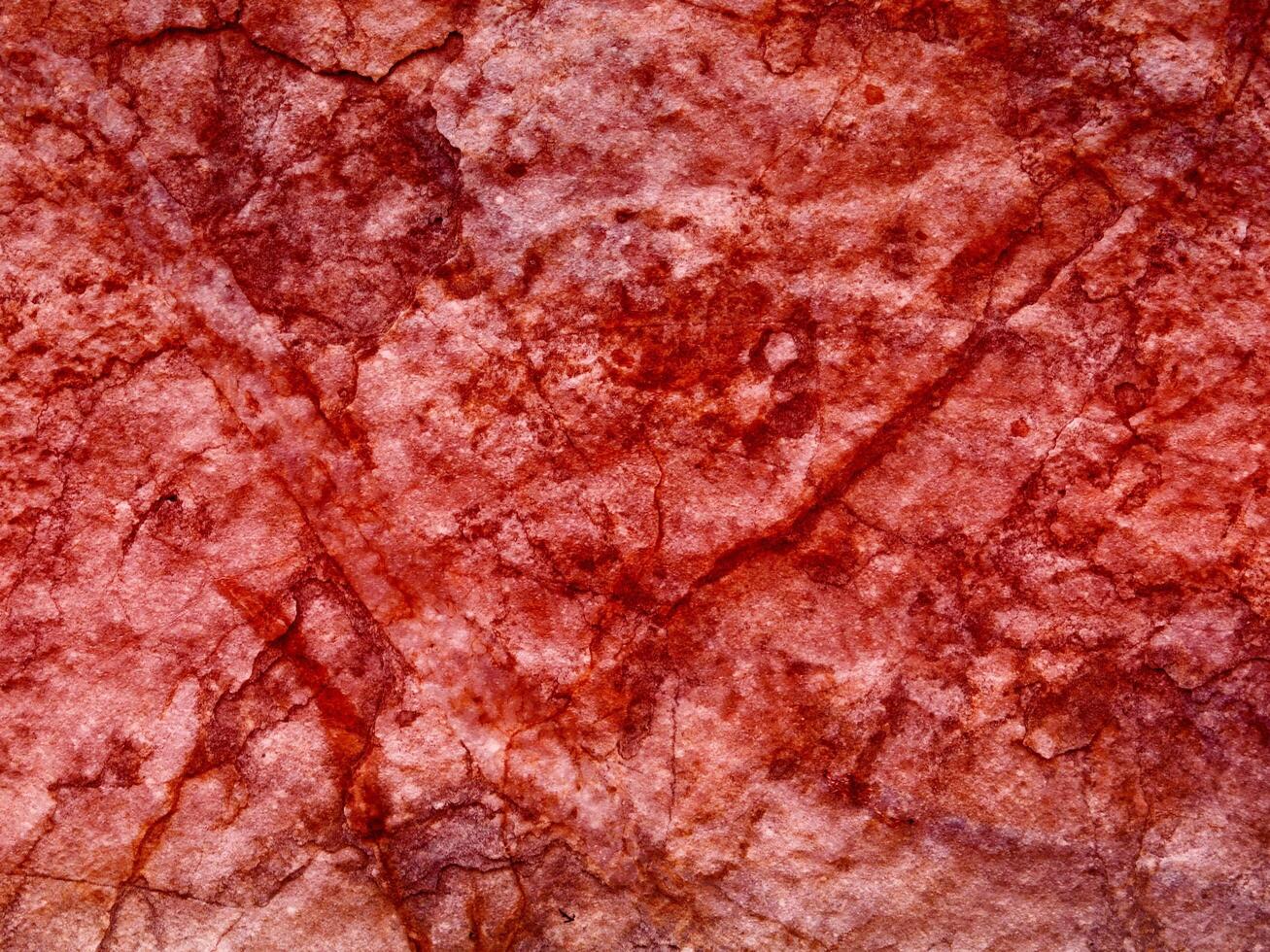 textura de piedra roja en el jardín foto