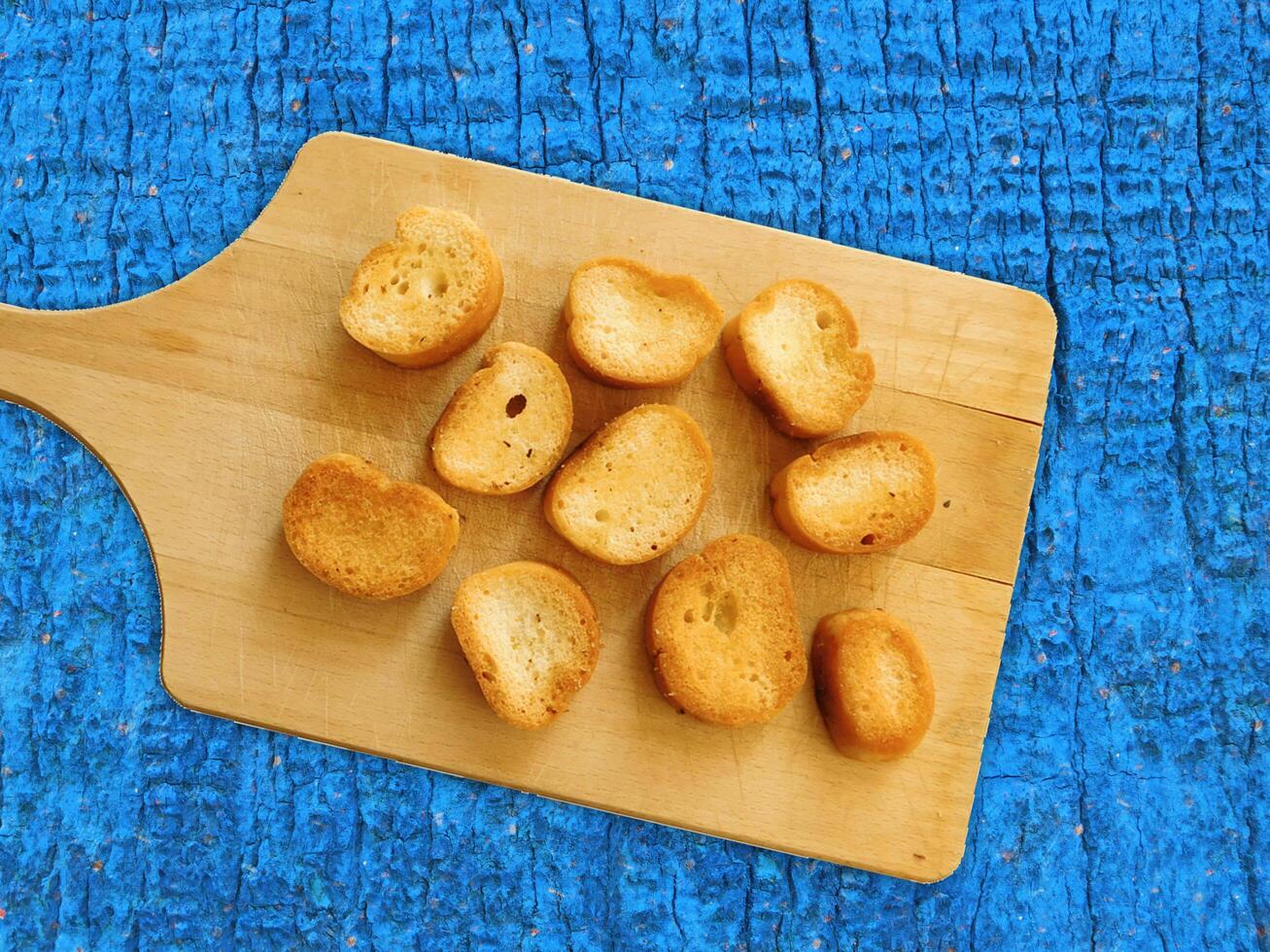 Bread On Wooden Background photo