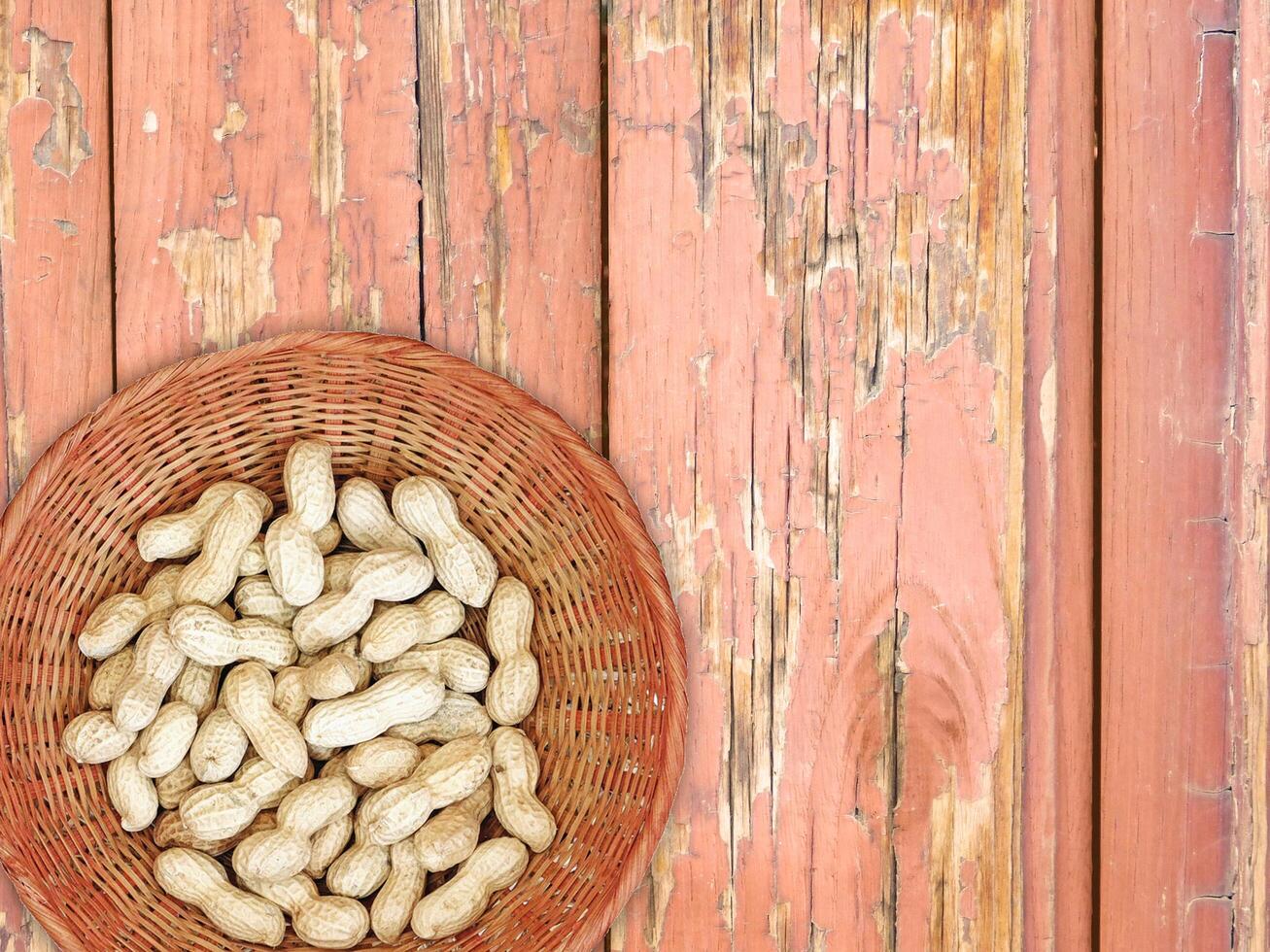Peanuts On The Wooden Background photo