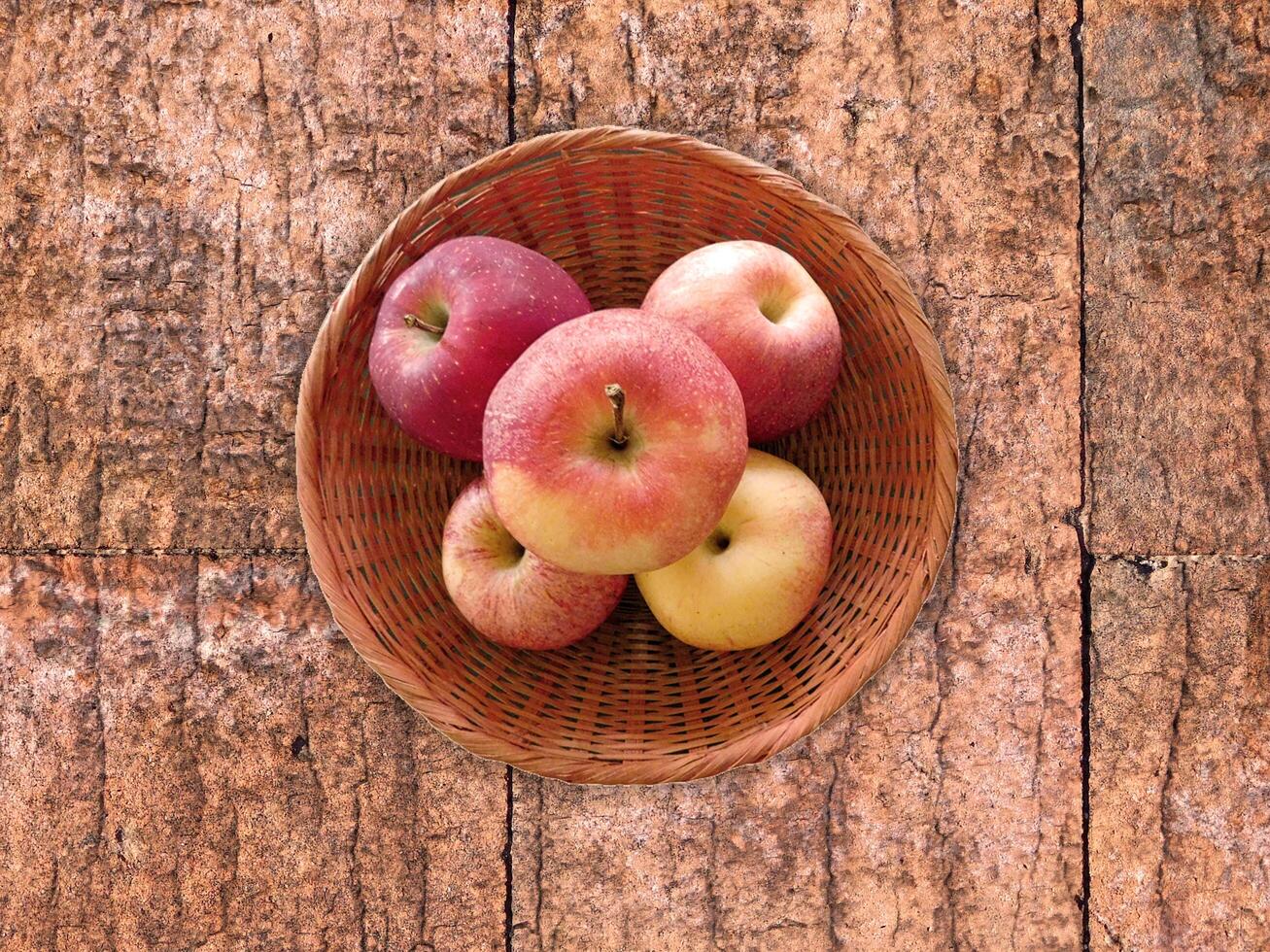 Apples On The Wooden Background photo