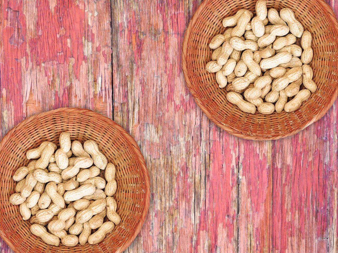Peanuts On The Wooden Background photo