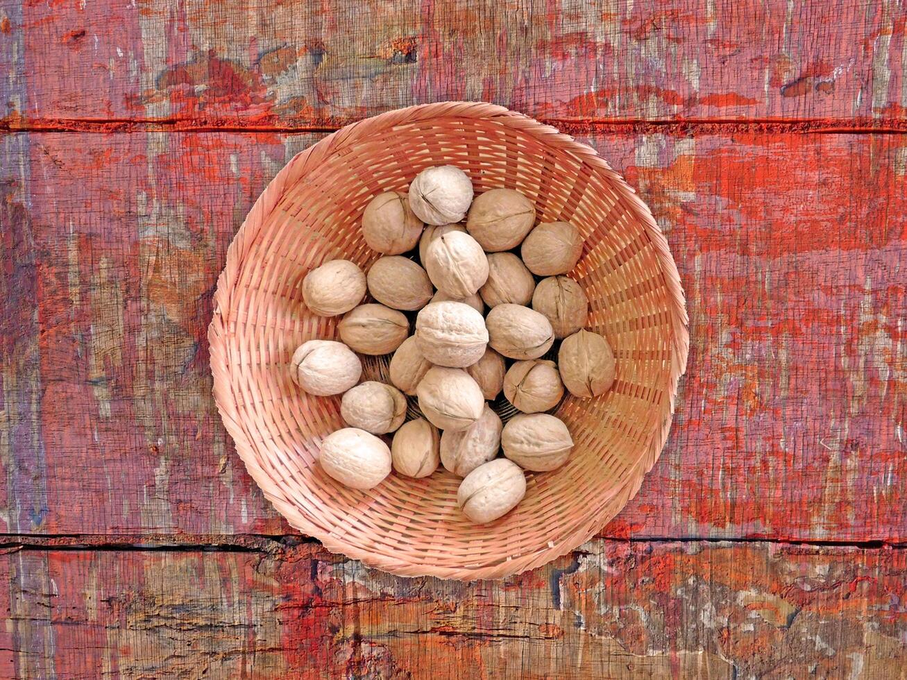 Nuts On The Wooden Background photo