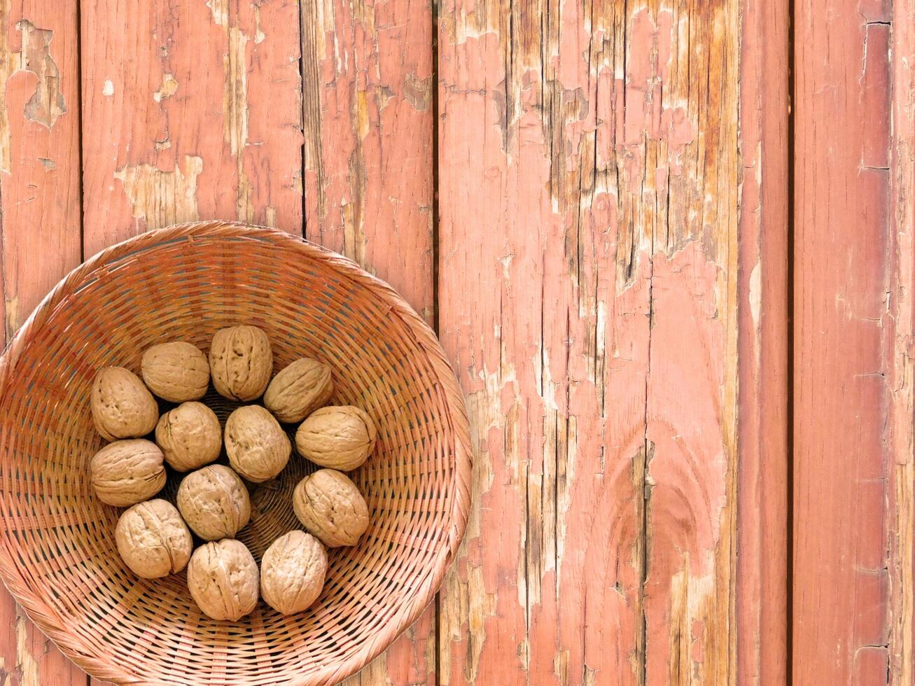 Nuts On The Wooden Background photo