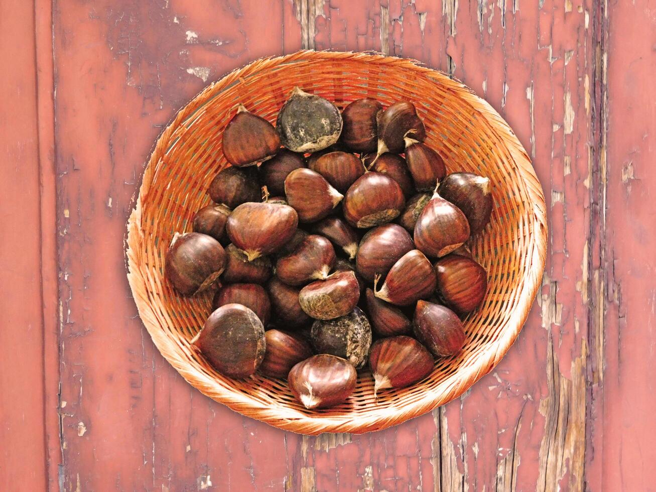 Chestnuts On The Wooden Background photo