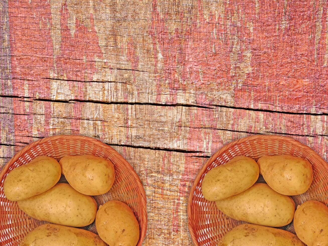 Potatoes On The Wooden Background photo