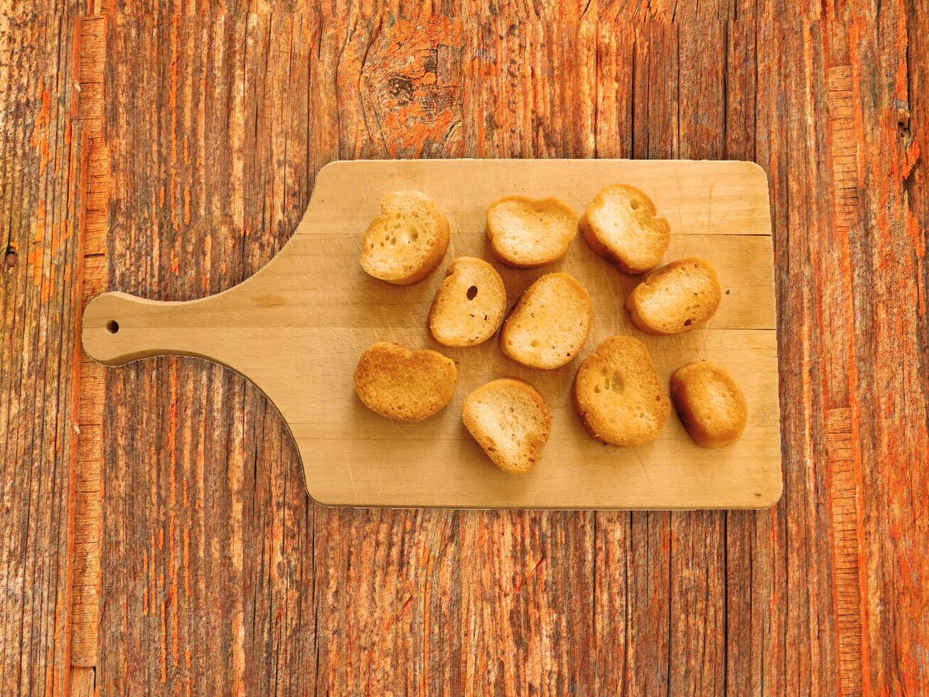 Bread On Wooden Background photo