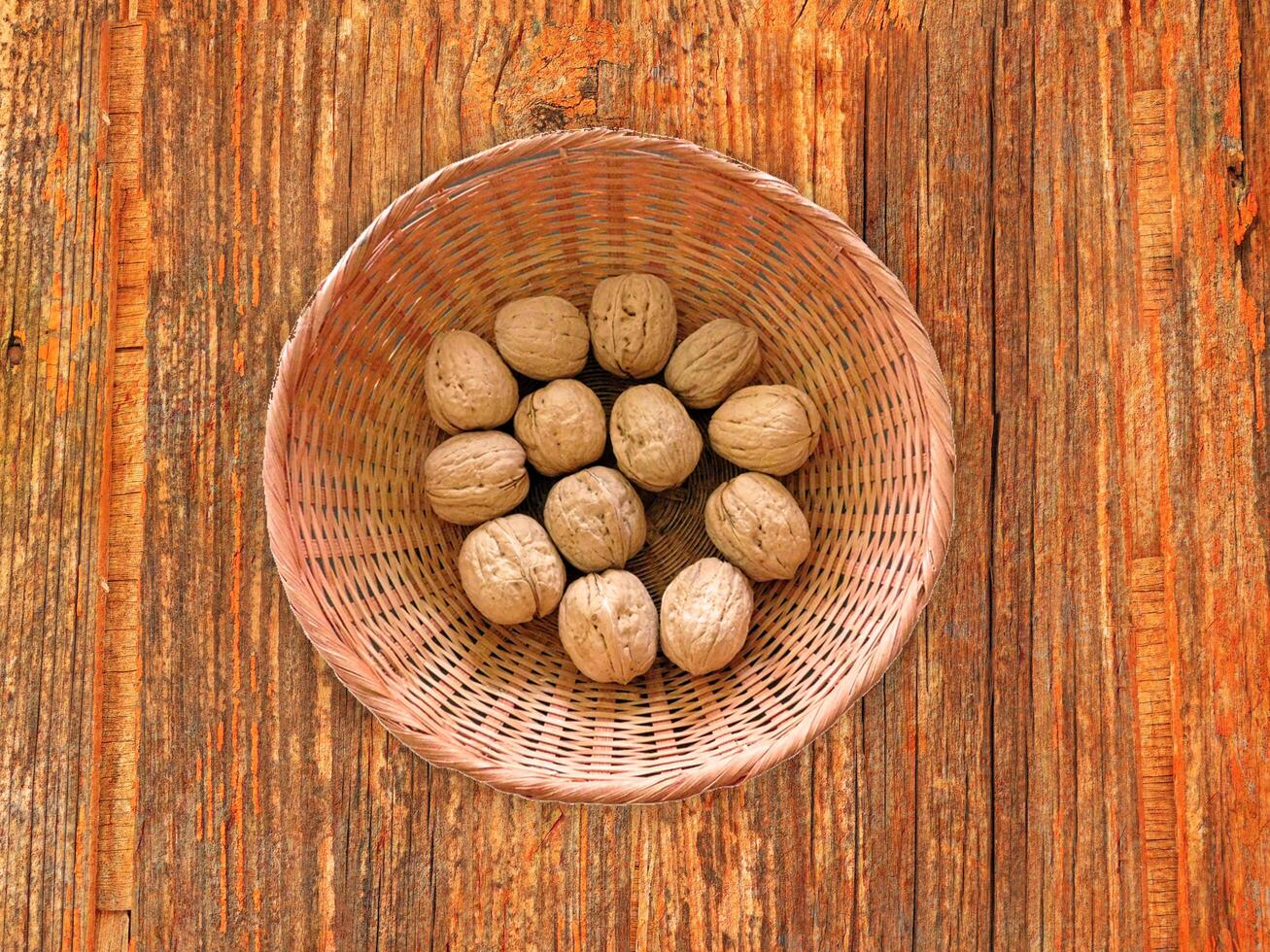 Nuts On The Wooden Background photo
