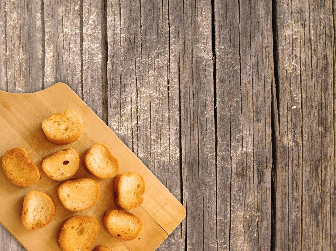 Bread On Wooden Background photo