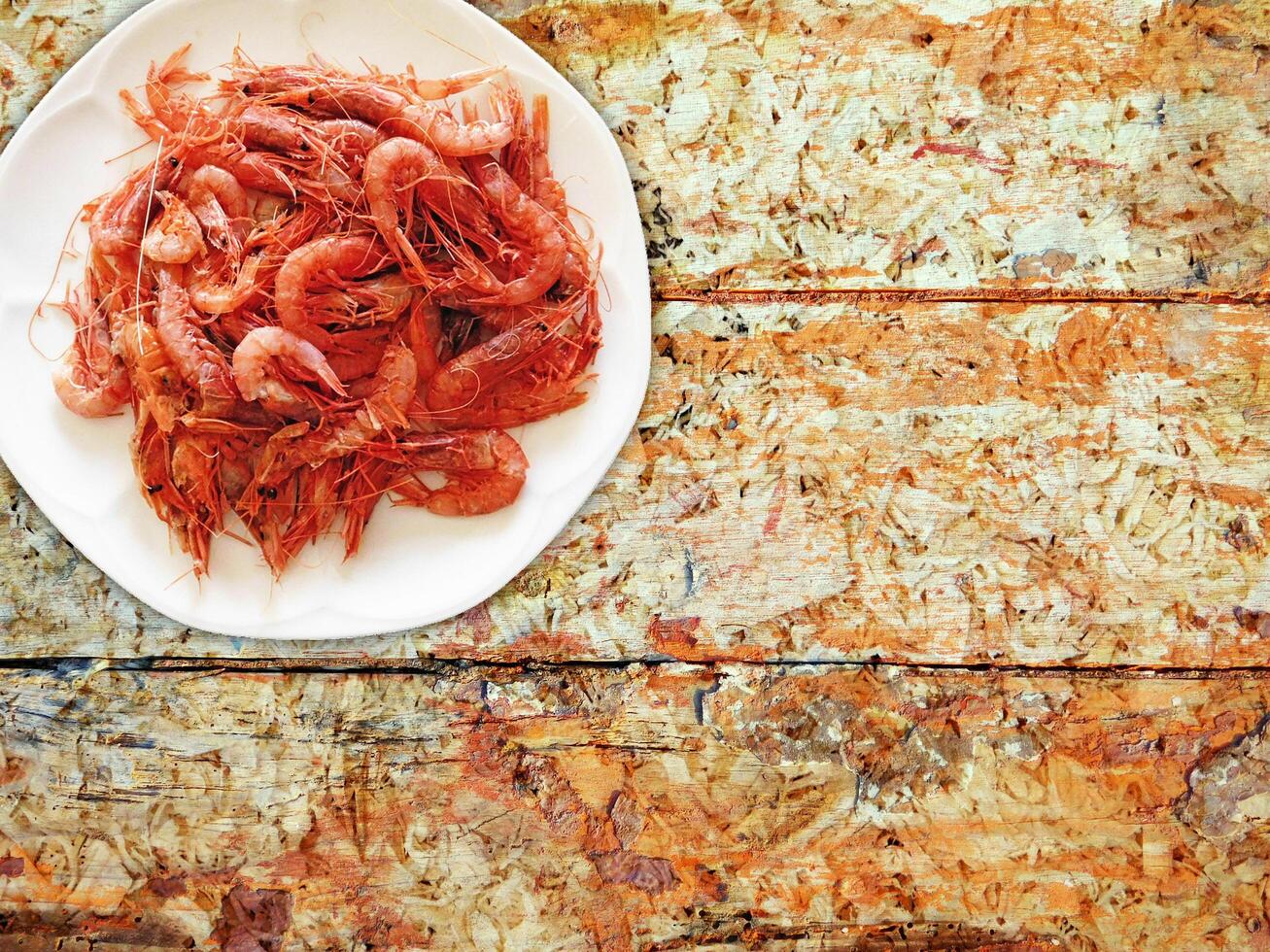 Shrimp On Wooden Background photo