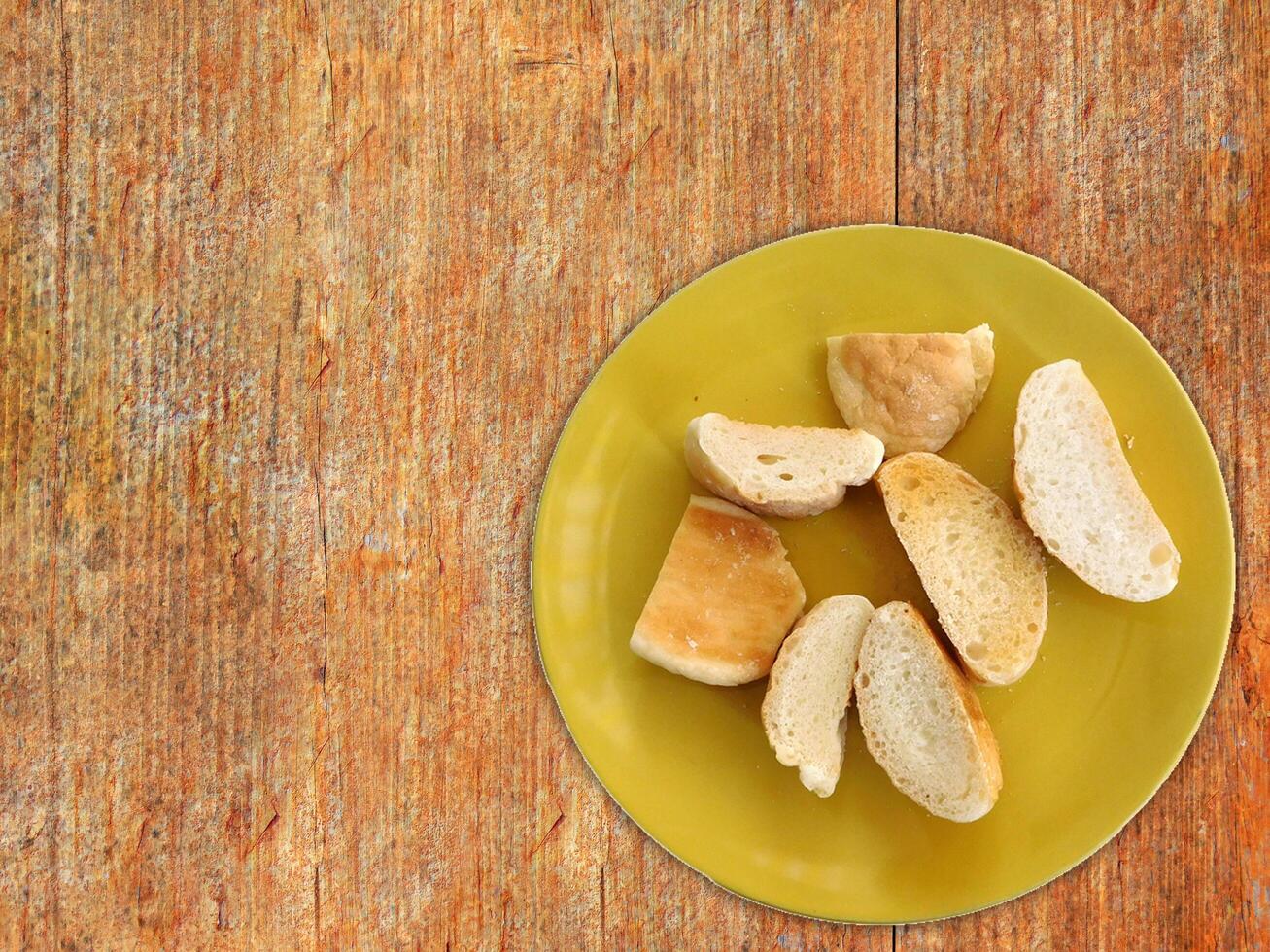 Bread On Wooden Background photo