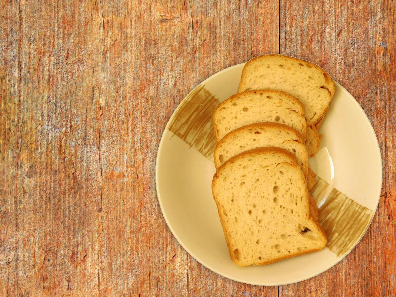 Bread On Wooden Background photo
