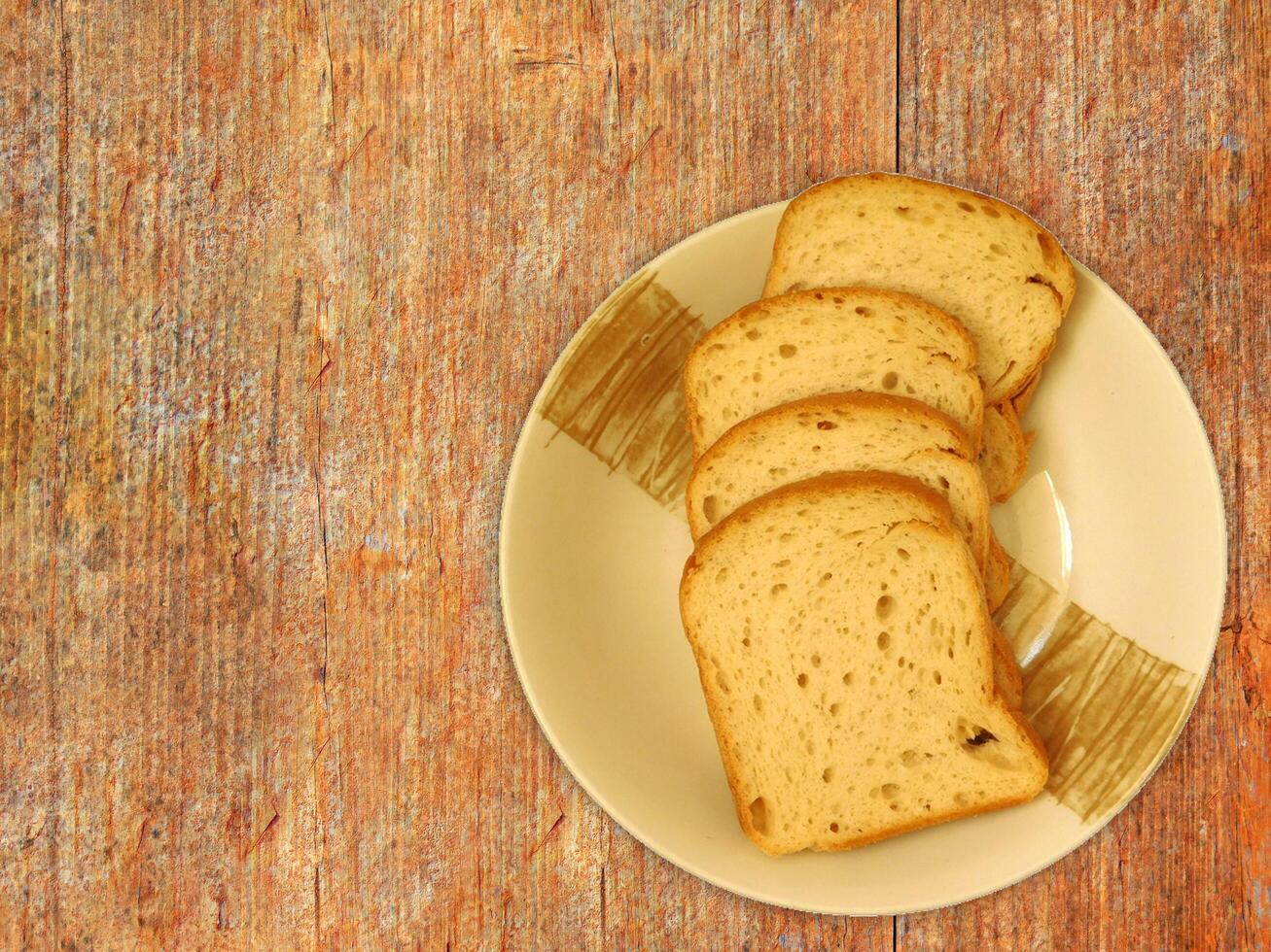 Bread On Wooden Background photo