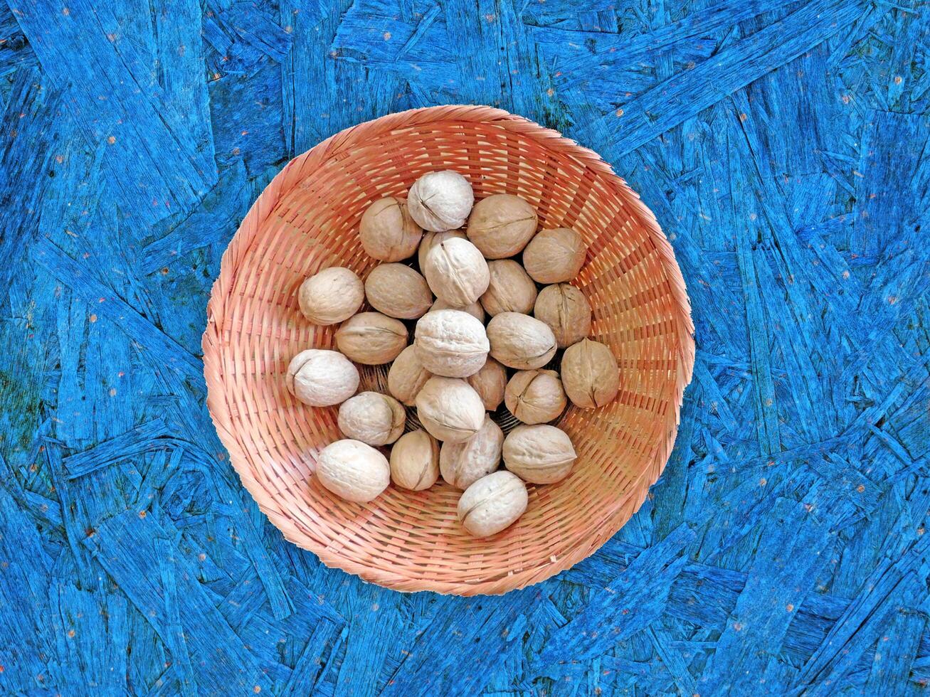 Nuts On The Wooden Background photo