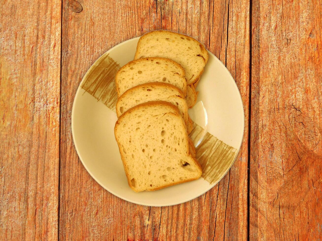 Bread On Wooden Background photo