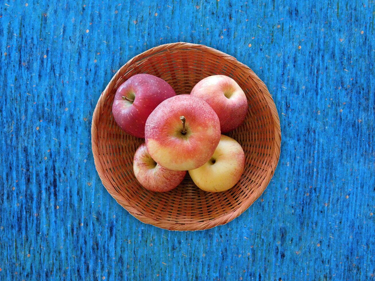 Apples On The Wooden Background photo