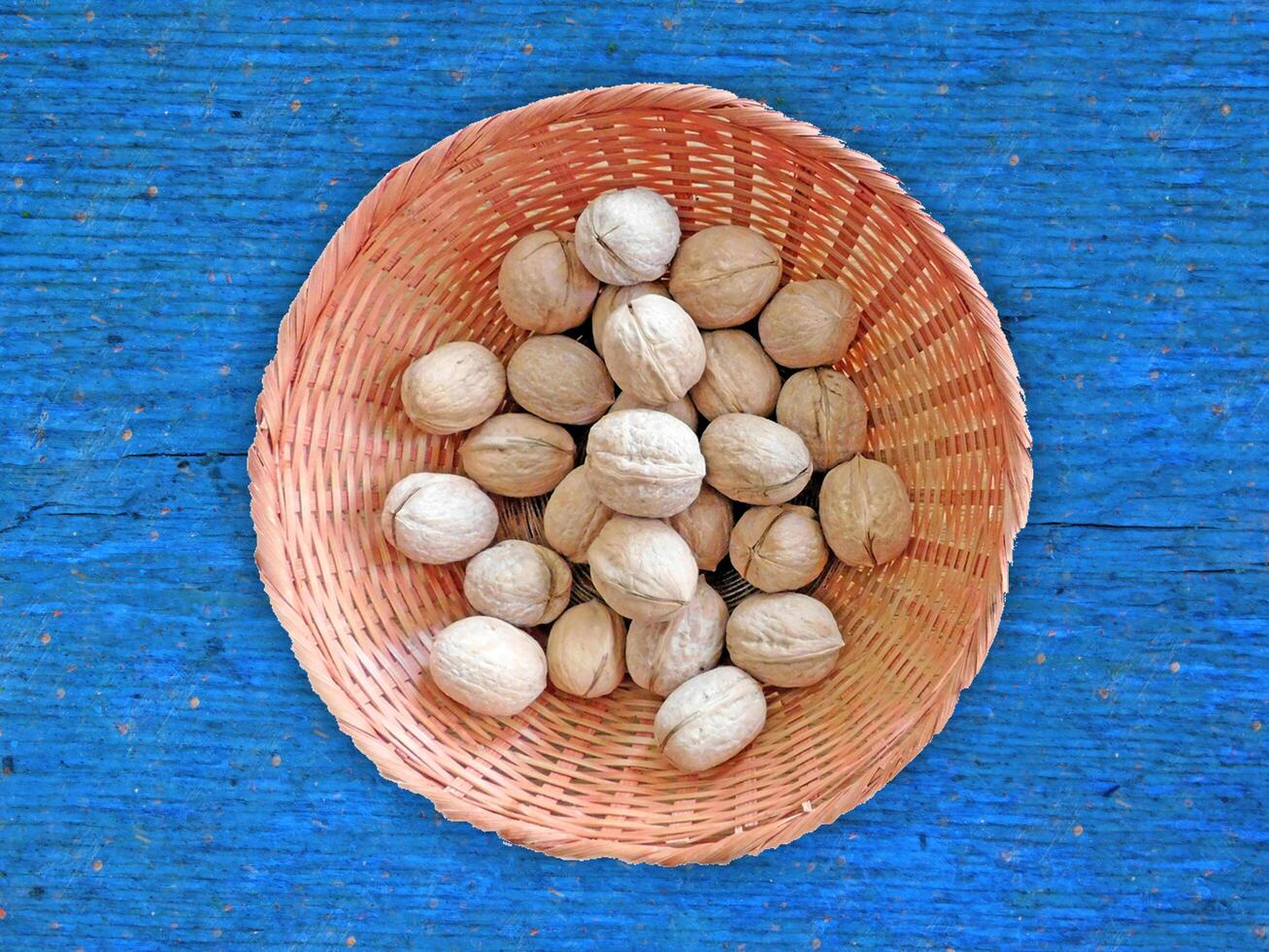 Nuts On The Wooden Background photo