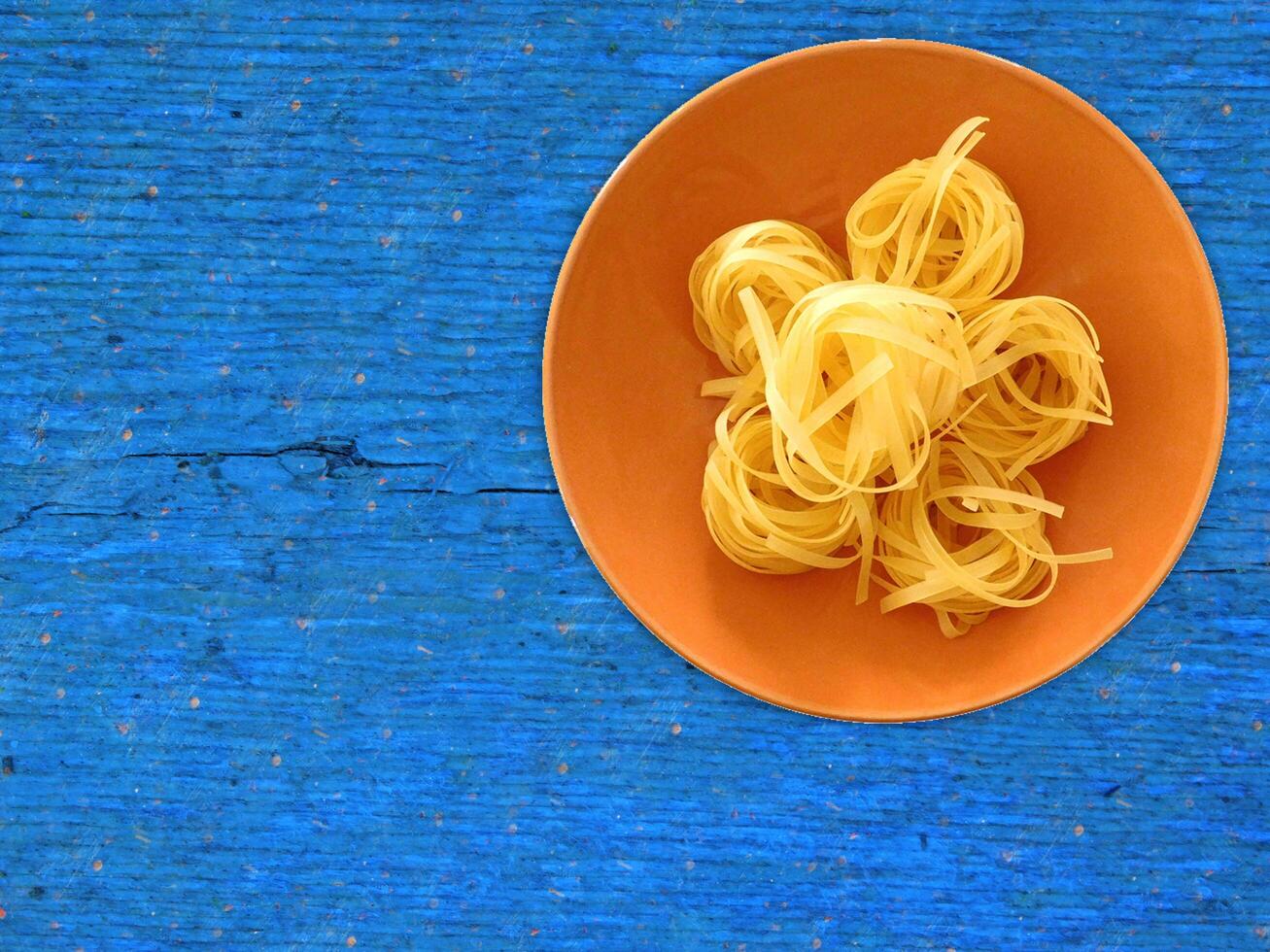 Pasta On Wooden Background photo