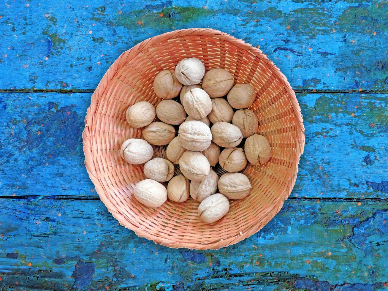 Nuts On The Wooden Background photo