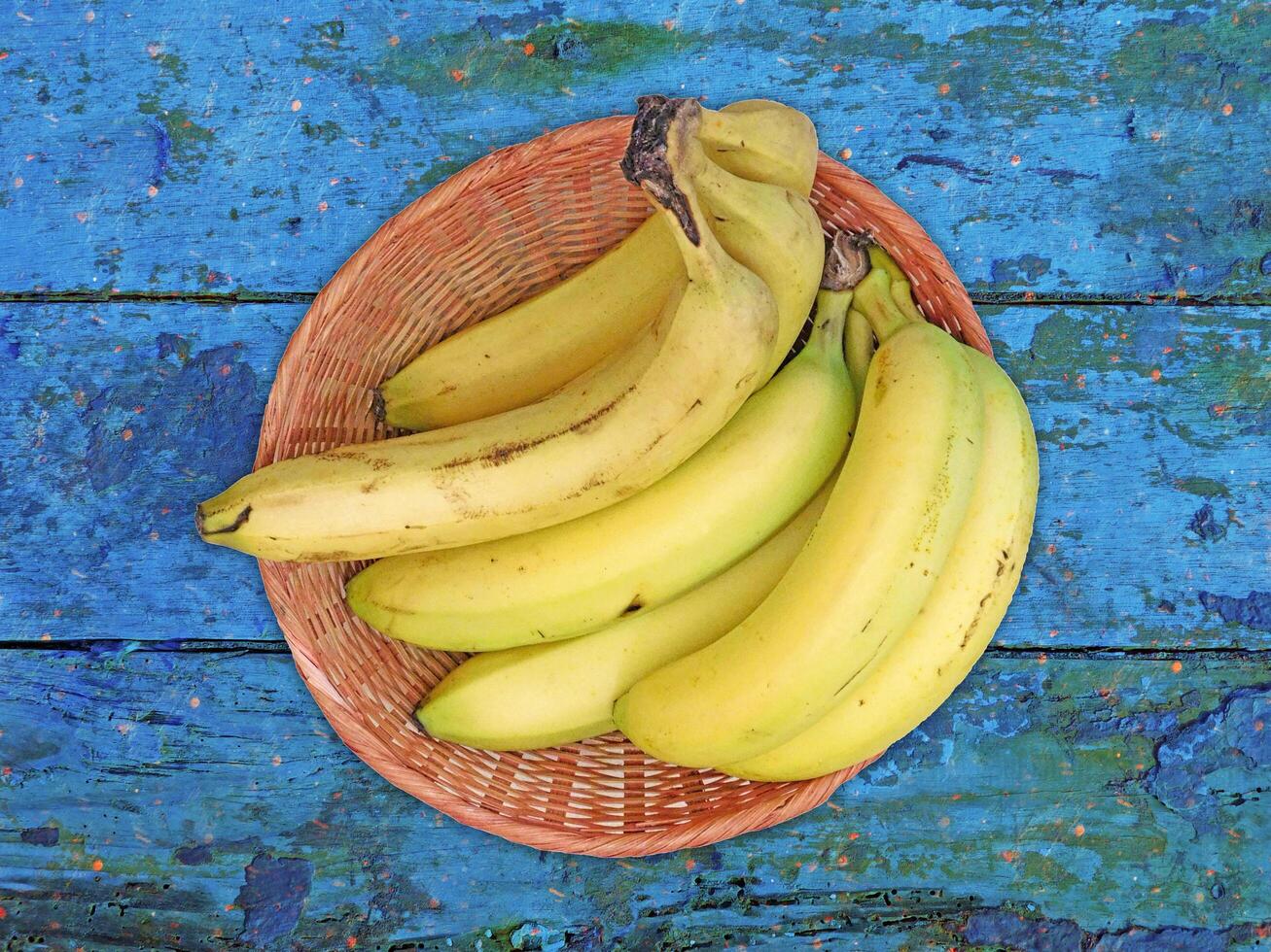 Bananas On The Wooden Background photo