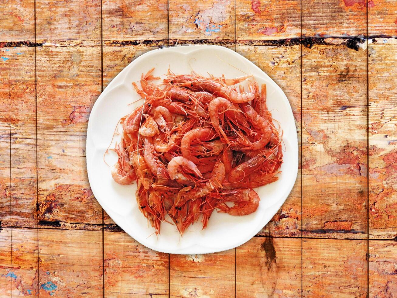 Shrimp On Wooden Background photo
