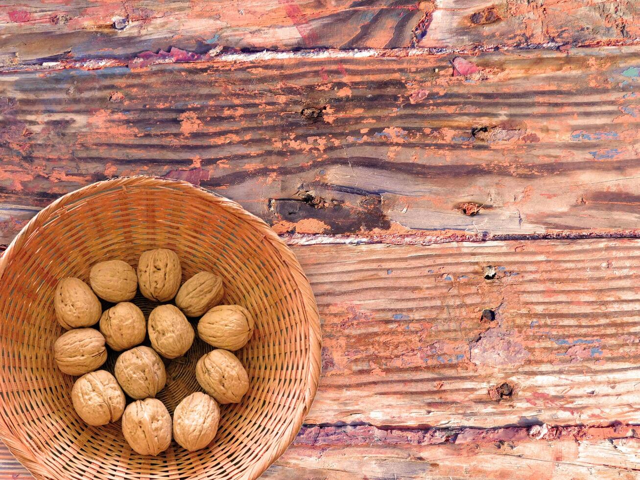 Nuts On The Wooden Background photo