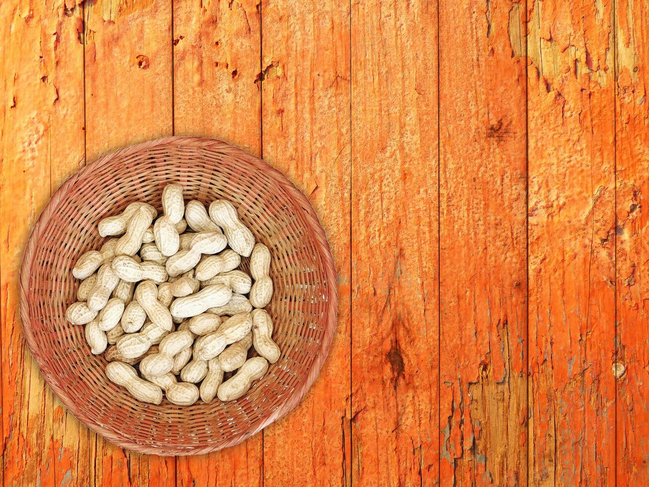 Peanuts On The Wooden Background photo