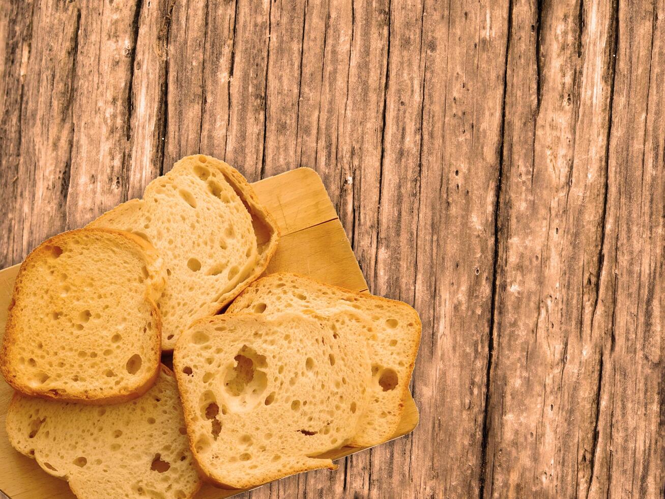 Bread On Wooden Background photo