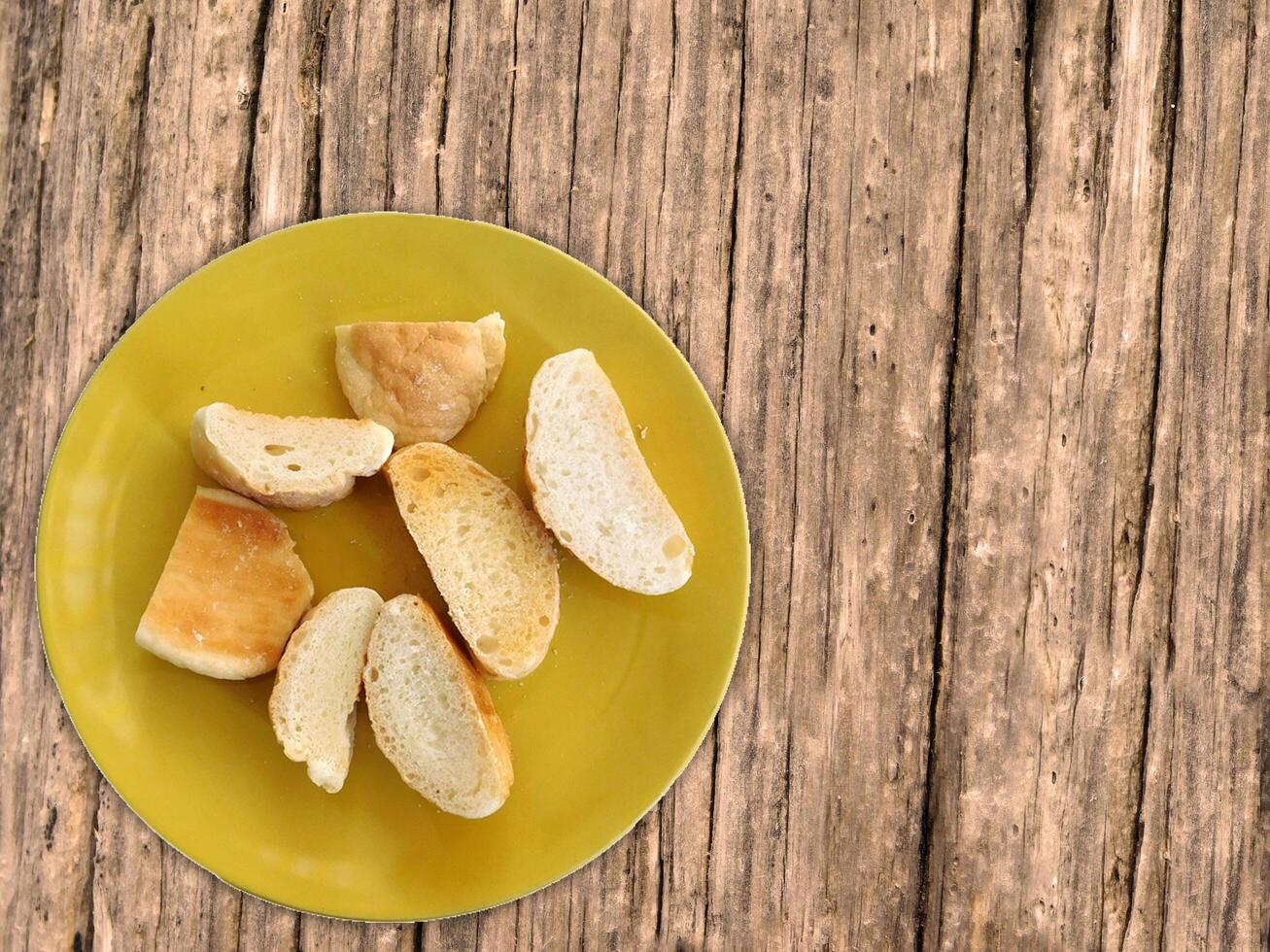 Bread On Wooden Background photo