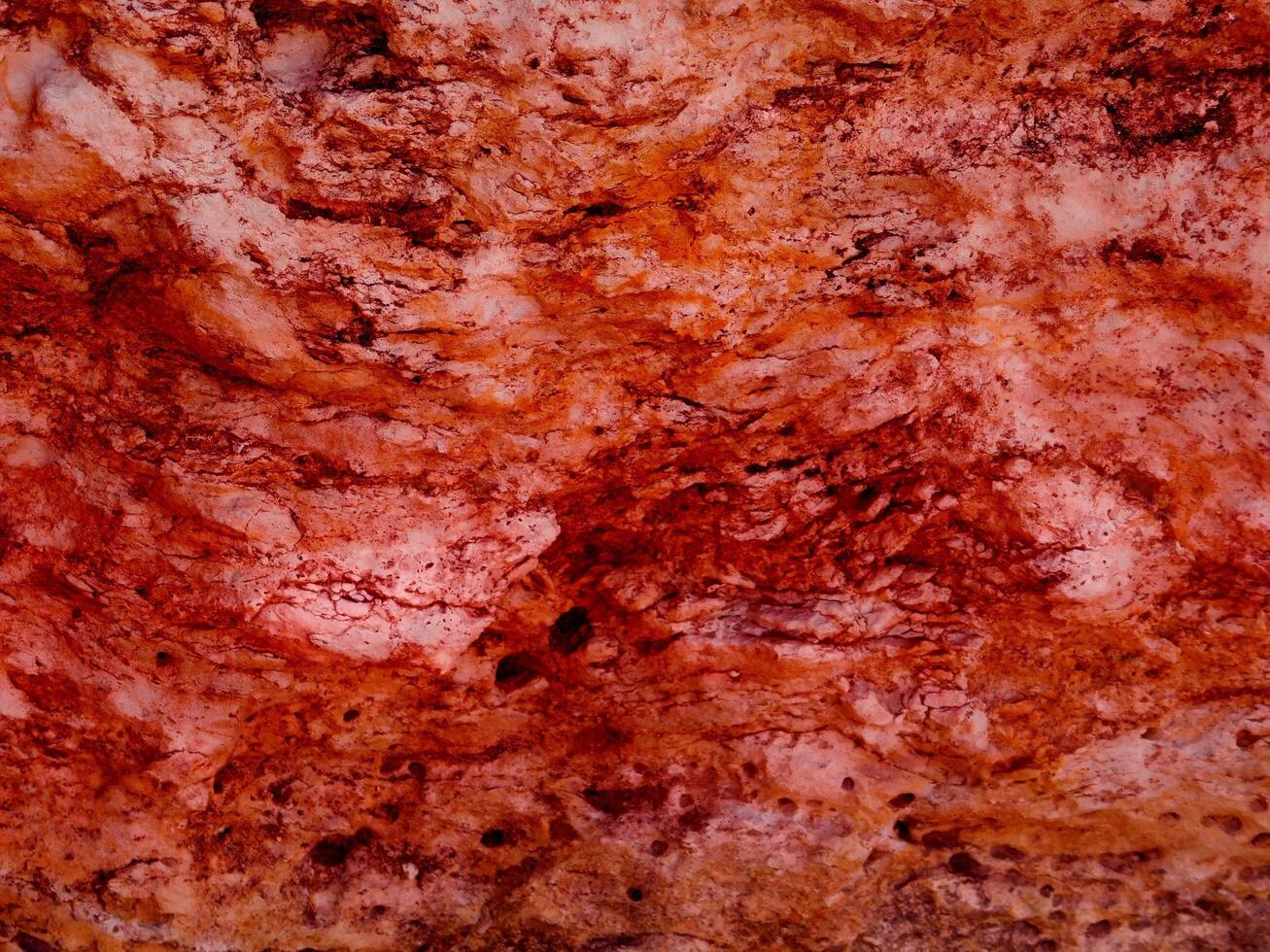 textura de piedra roja en el jardín foto