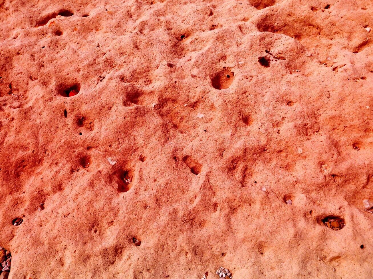 Texture Of Red Stone In The Garden photo