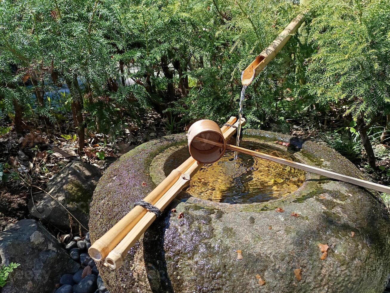 stone wash basin for Japanese garden decoration, landscape orientation photo