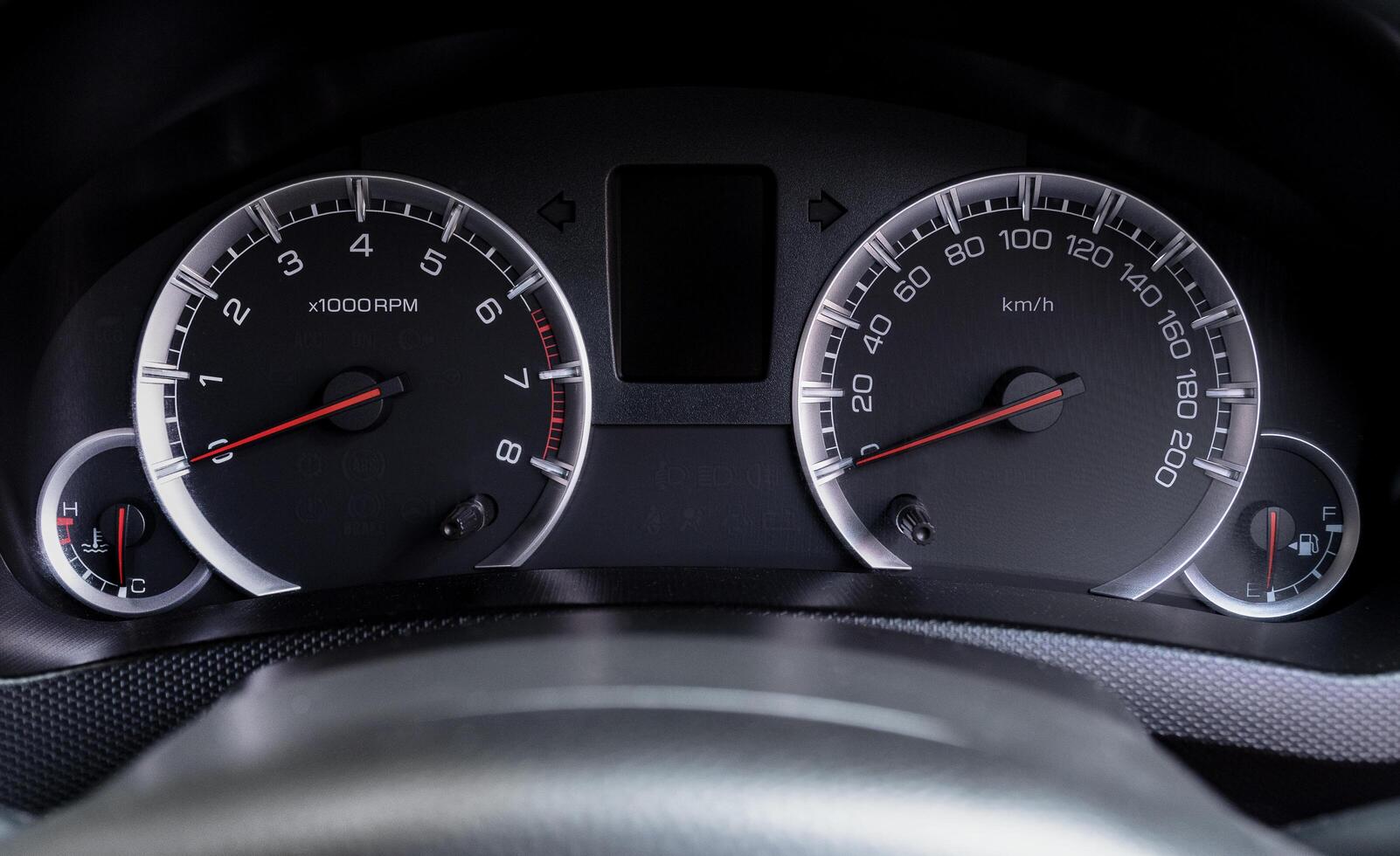 Close up black car analog dashboard photo