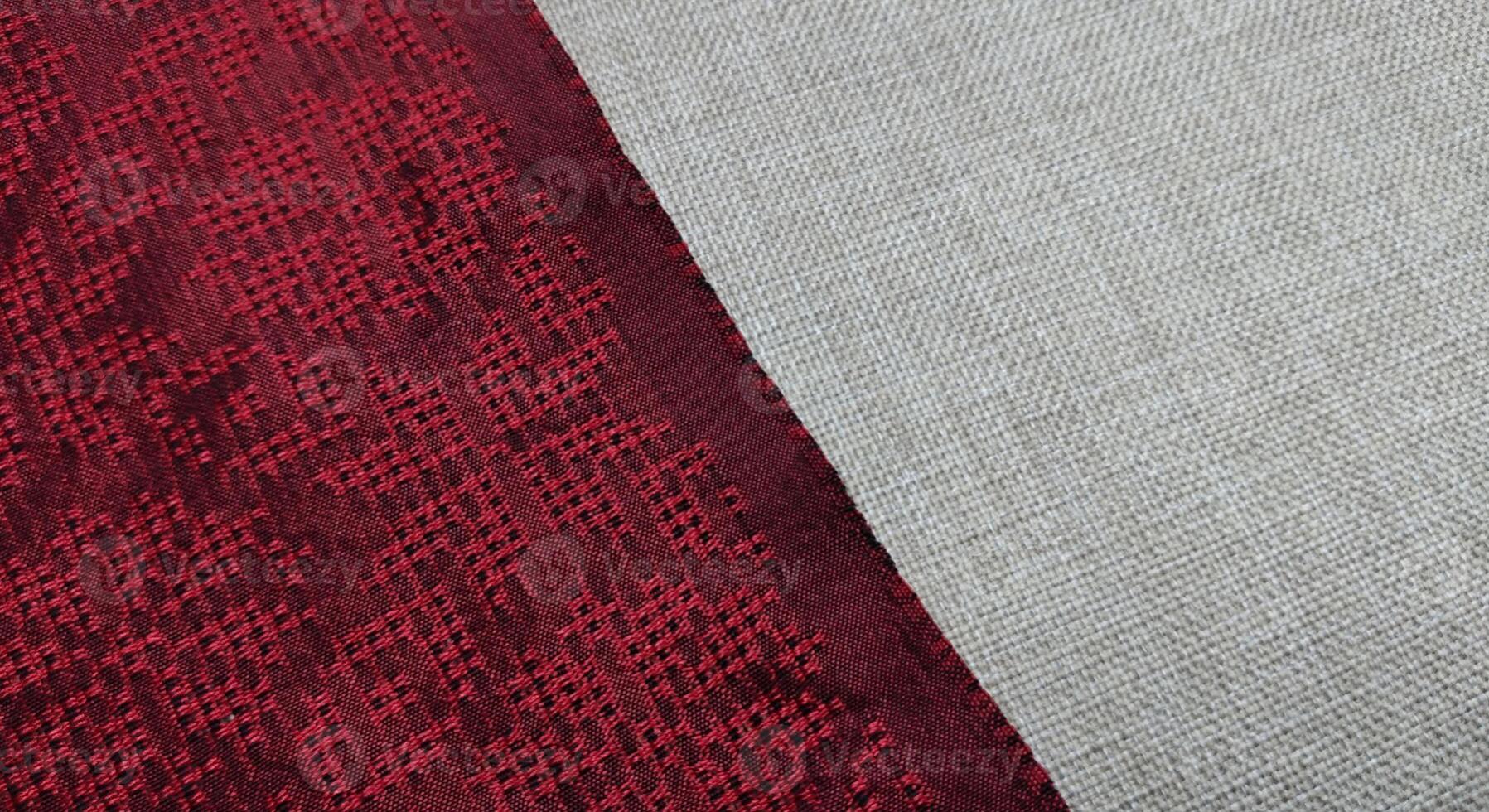 Texture, background, pattern. The fabric is red with a pattern of geometric figures. This is a detailed close-up of the fabric. photo