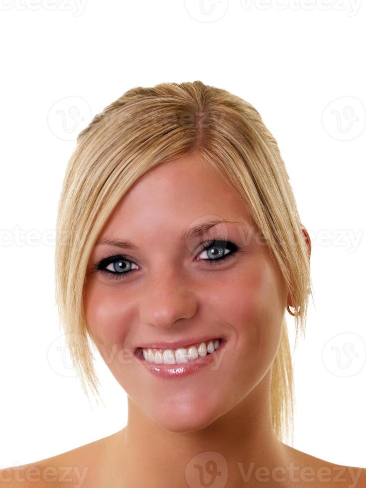 Portrait of smiling young blond woman blue eyes photo