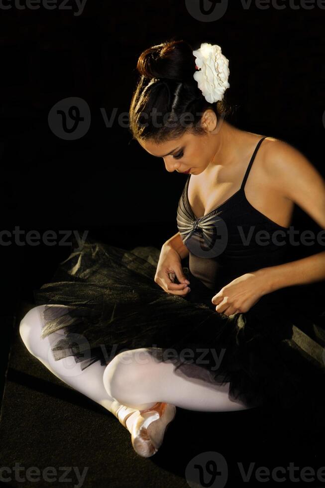 Young African American Teen Girl Sitting In Dance Outfit photo