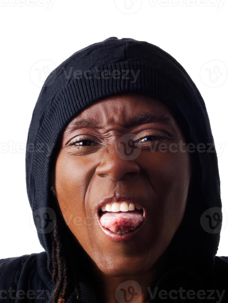 African American Woman Making Face With Tongue Out Wearing Hood photo