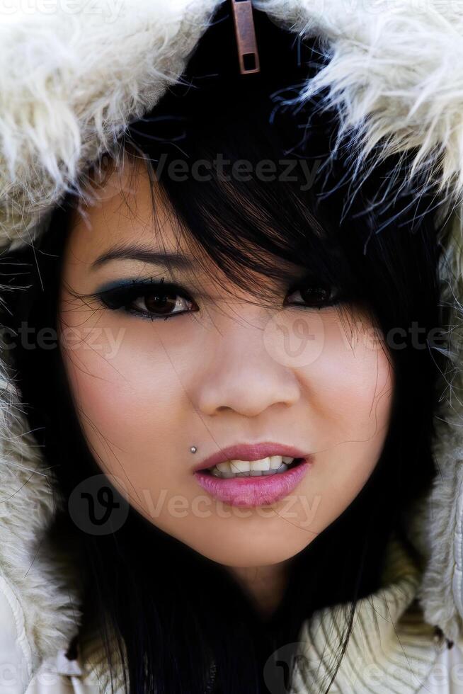 Attractive Asian American In Winter Coat Hood Portrait photo