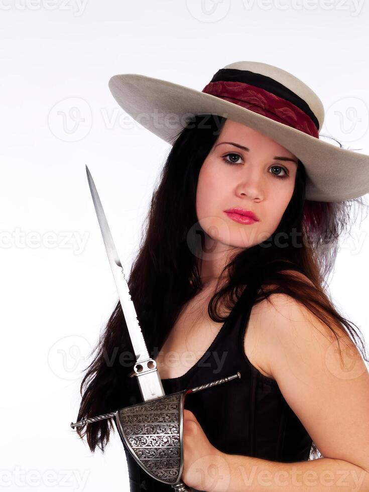 joven caucásico mujer en sombrero participación daga foto