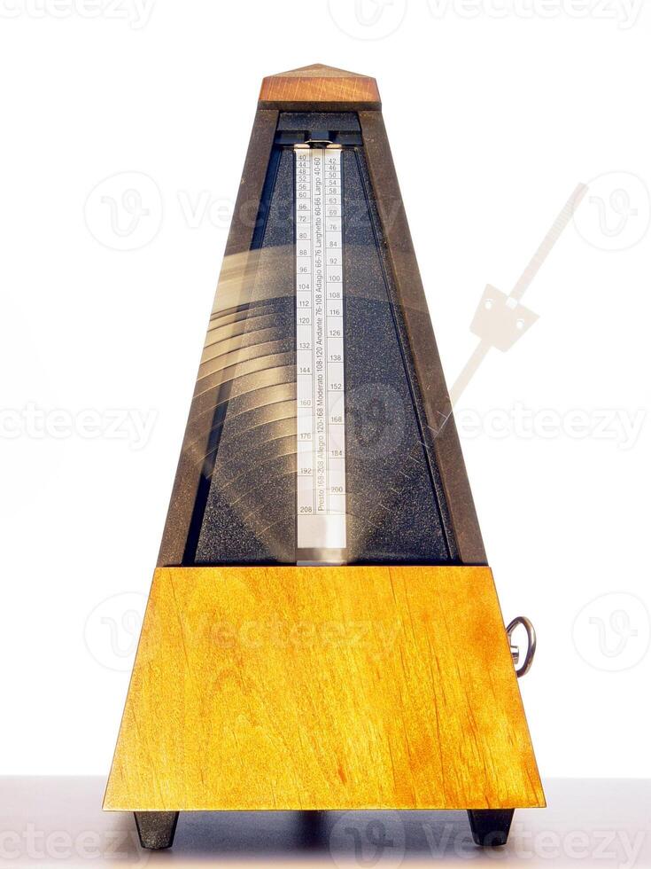 Wooden Mechanical Metronome With Blurred Motion Arm photo