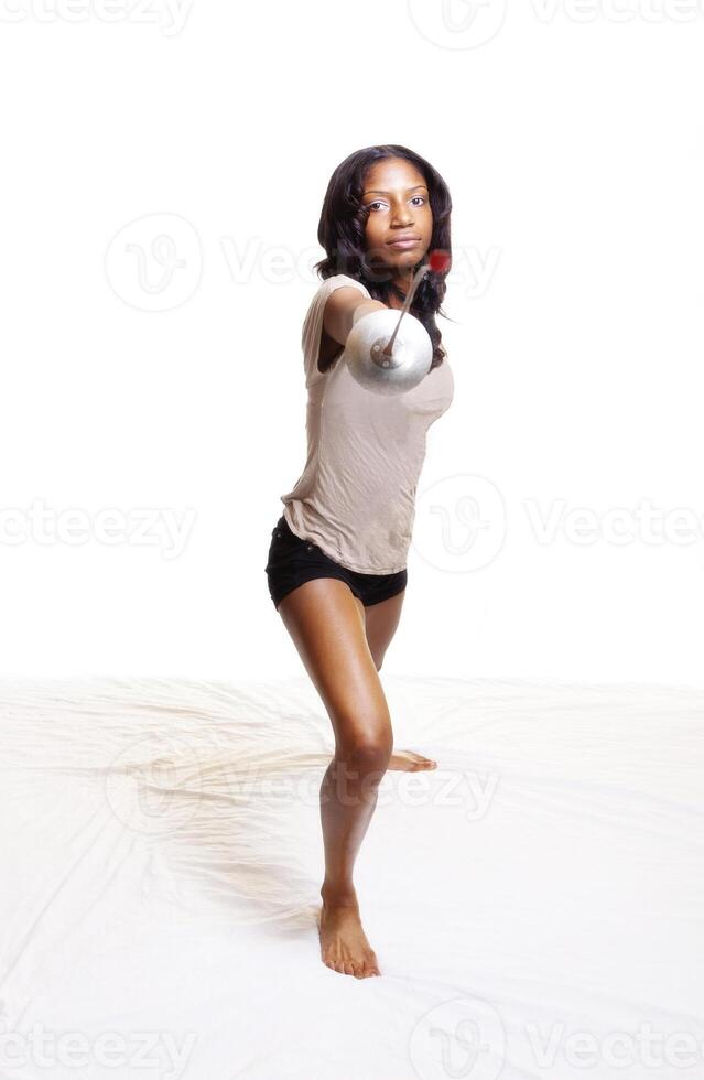 Black Woman With Fencing Foil In Lunge photo