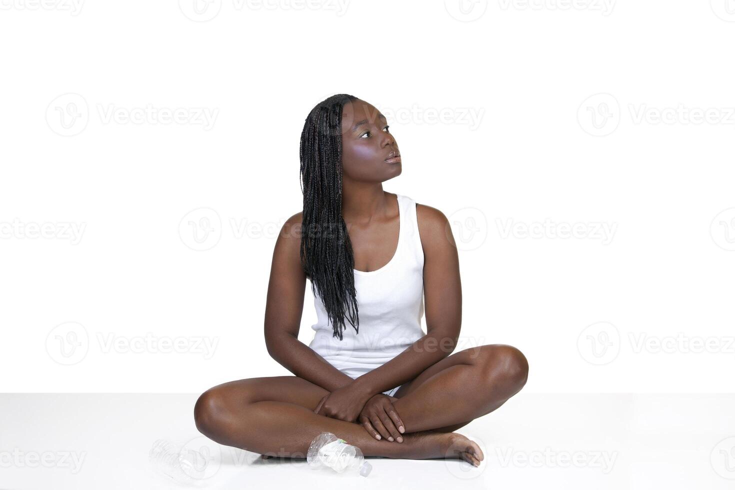 African American Woman With Sitting Plastic Bottle photo