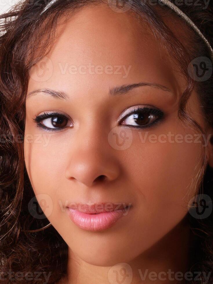 Pretty young teen black girl closeup portrait photo