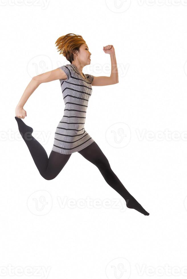 Skinny Asian American Woman Jumping In Knit Dress photo