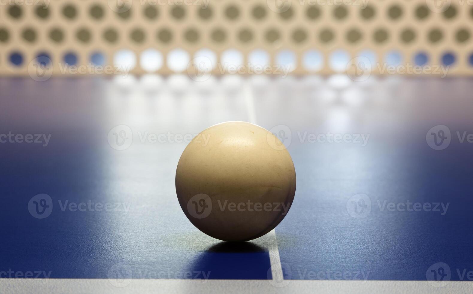 Closeup Of Ping Pong Ball Sitting On Table photo