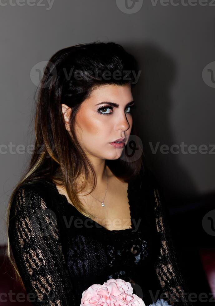 Pretty Caucasian Woman In Black Lace Top With Dark Hair photo